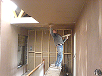 Plastering of a ceiling